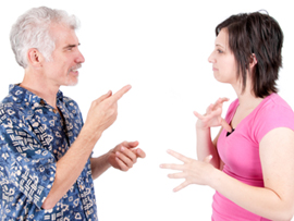 Picture of a man and a woman using Australian sign language to talk.