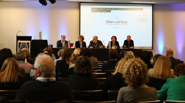 Image of audience and Conference panel
