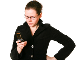 Picture of woman looking at mobile phone in frustration