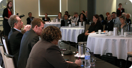 Banner image for ACCAN Events picturing ACCAN CEO and industry representatives taking part in a consultative forum.