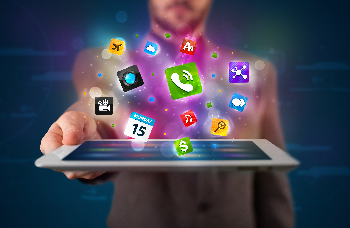 Man holding a tablet with App icons floating out.