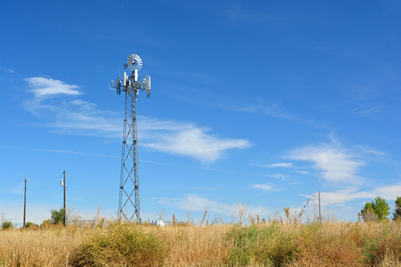 Mobile phone infrastructure mounted on remote windmill