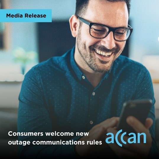 Man smiling at phone, tag reads Consumers welcome new outage communications rules