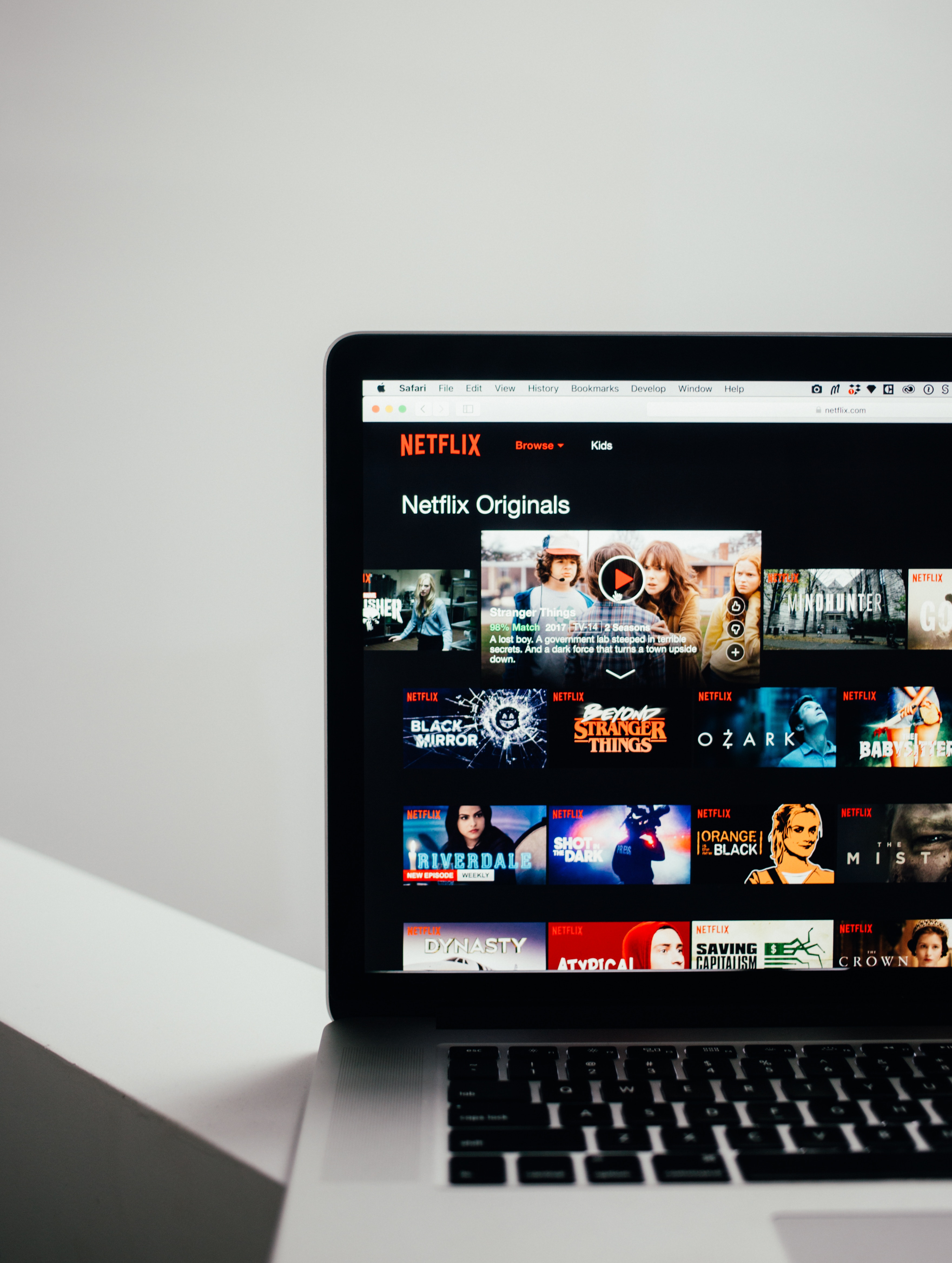 Computer displaying various options on Netflix