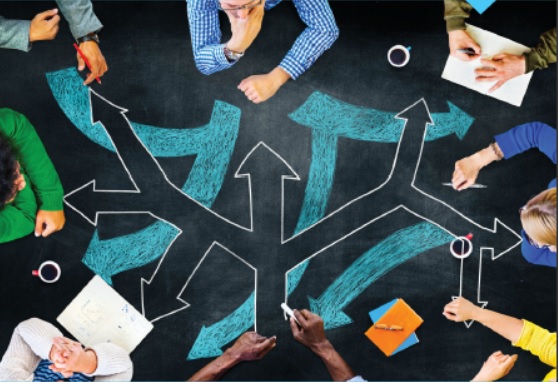 Graphic showing intertwined arrows on a table top with people seated around it