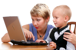 Picture of mother and son using laptop