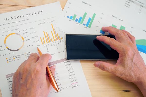 Person looking through bills