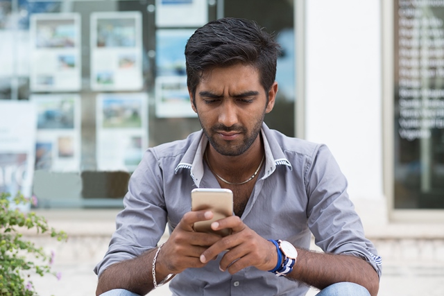 Man using mobile phone