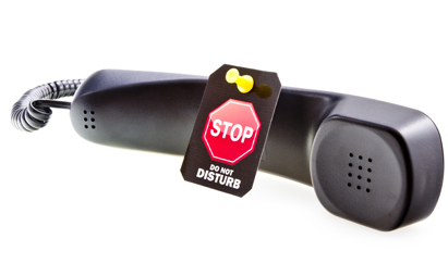 phone with "stop do not disturb" sign